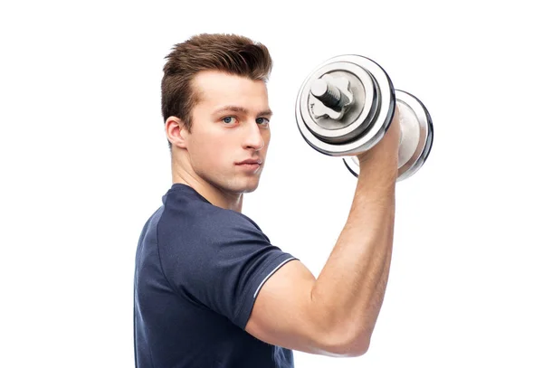 Sportive young man with dumbbell — Stock Photo, Image