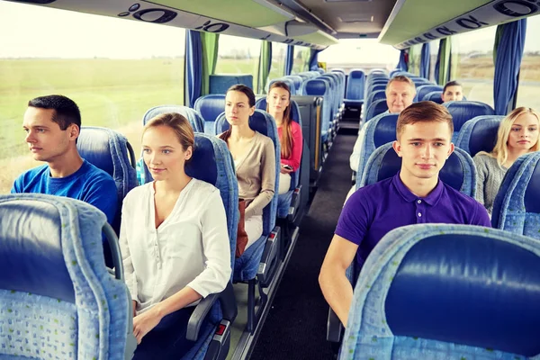 Group of passengers or tourists in travel bus — Stock Photo, Image