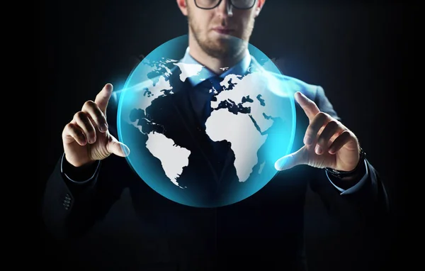 Närbild av affärsman med jorden projektion — Stockfoto