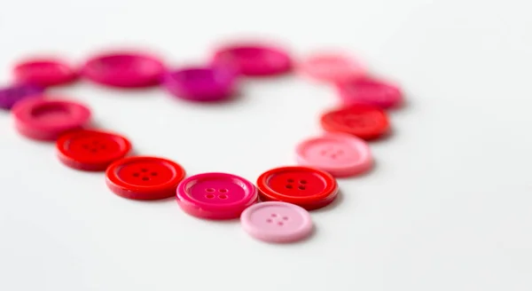 Forma de corazón de los botones de costura —  Fotos de Stock