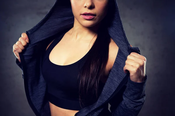 Close up of woman posing and showing sportswear — Stock Photo, Image