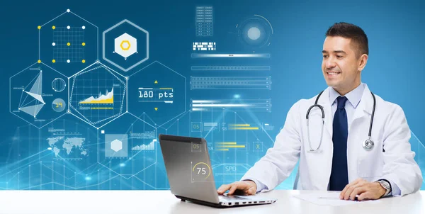 Male doctor with laptop over virtual charts — Stock Photo, Image