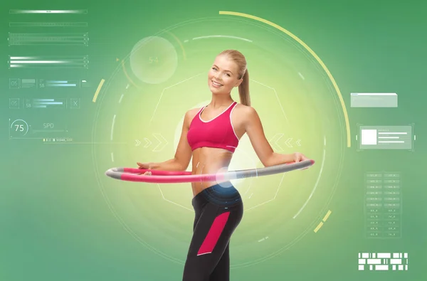 Young sporty woman with hula hoop — Stock Photo, Image