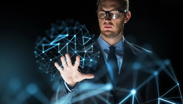 Businessman touching virtual projection — Stock Photo, Image