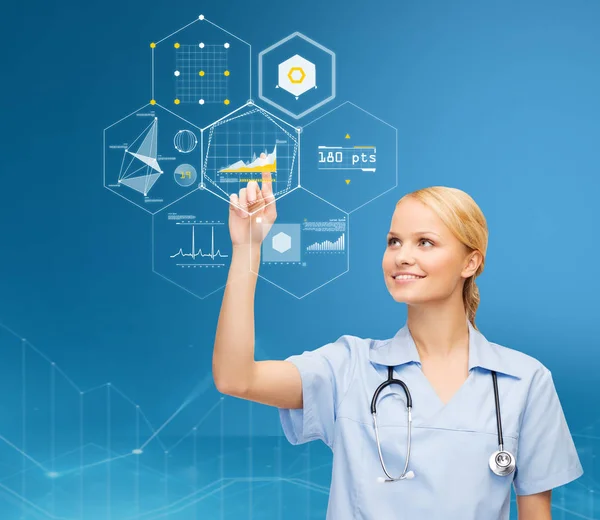 Doctor pointing finger to virtual chart over blue — Stock Photo, Image