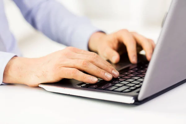Close up of male hands with laptop typing — Stock Photo, Image