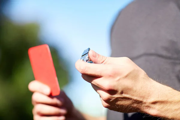 Referee with whistle and red card at soccer game — Stock Photo, Image