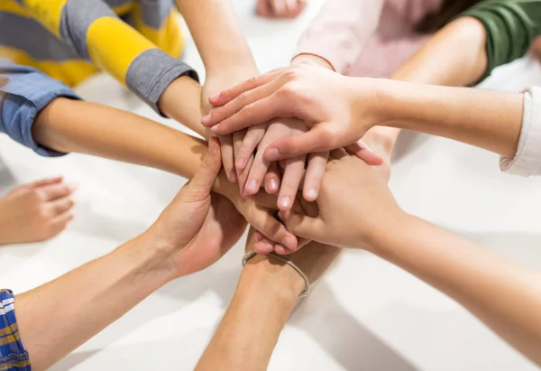 Group of kinds with hands on top — Stock Photo, Image