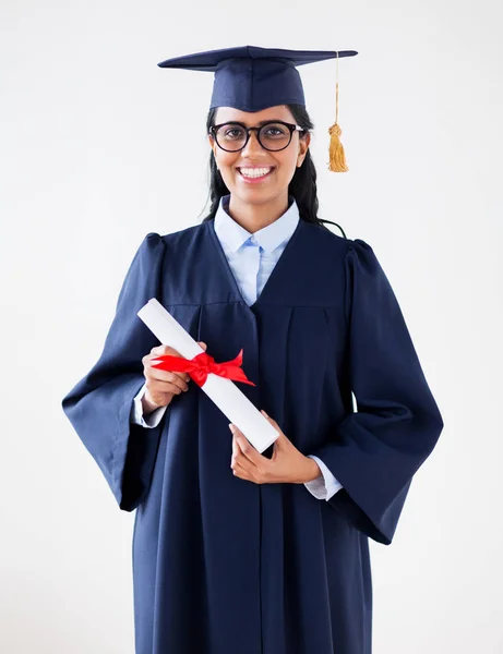 Happy bachelor woman in mortarboard with diplomas — Stock Photo, Image