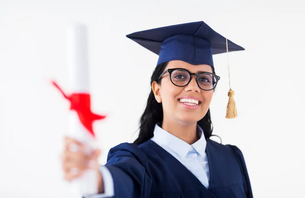Happy bachelor woman in mortarboard with diplomas — Stock Photo, Image