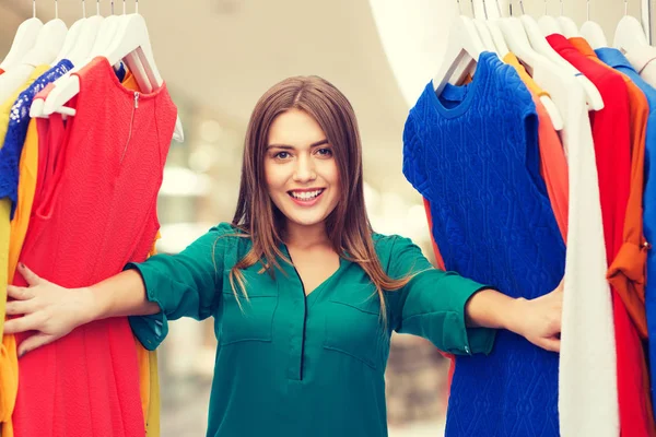 Happy woman choosing clothes at home wardrobe — Stock Photo, Image