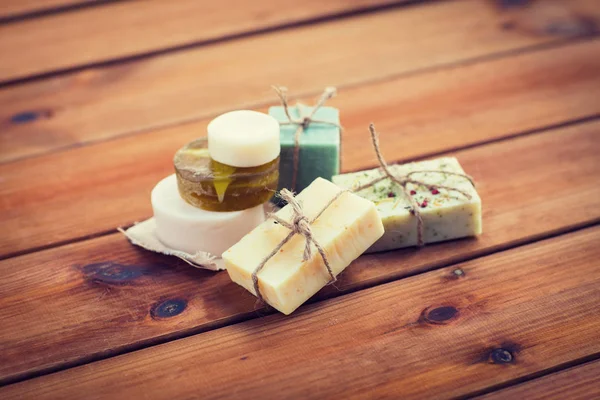 Close up of handmade soap bars on wood — Stock Photo, Image