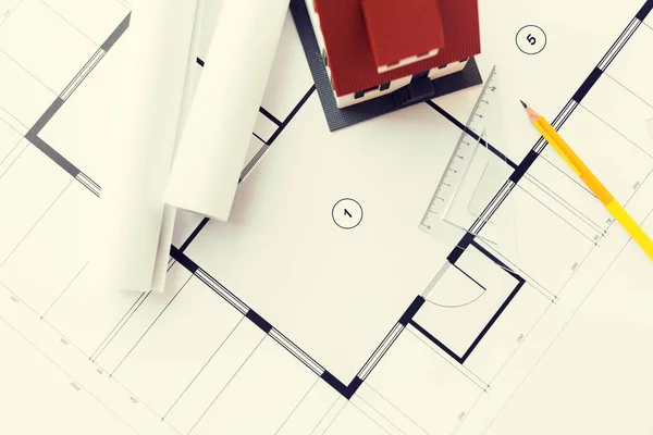 Close up of house model on architectural blueprint — Stock Photo, Image