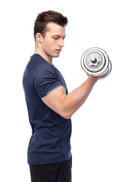 Sportive young man with dumbbell — Stock Photo, Image