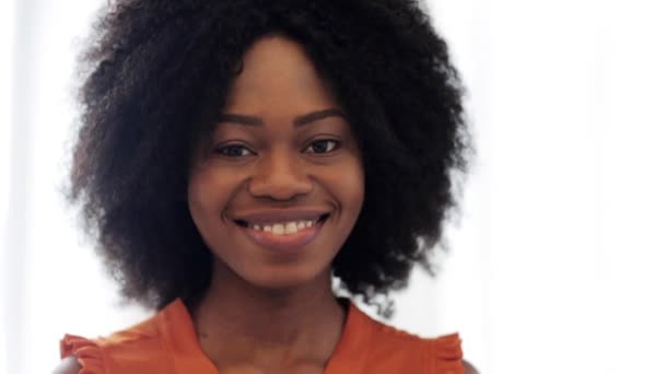 Happy smiling african american young woman face — Stock Video