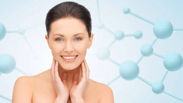 Beautiful young woman face with molecules — Stock Photo, Image