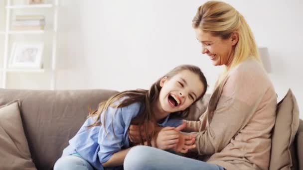 Happy family having fun and tickling at home — Stock Video