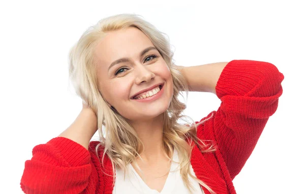 Happy smiling young woman in red cardigan — Stock Photo, Image