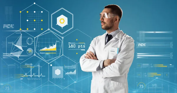 Doctor or scientist in lab coat and safety glasses — Stock Photo, Image