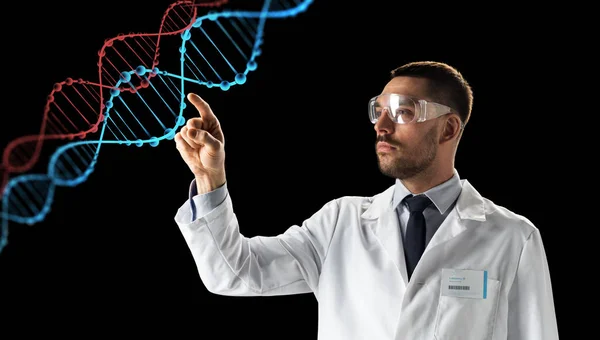 Scientist in goggles with dna molecule — Stock Photo, Image