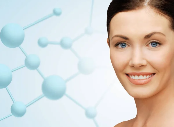 Mooie jonge vrouw gezicht met moleculen — Stockfoto
