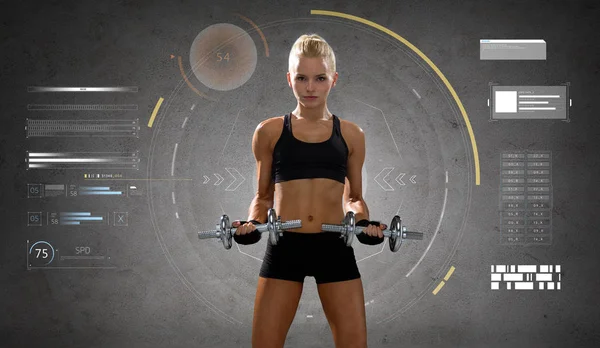 Happy young sporty woman exercising with dumbbells — Stock Photo, Image