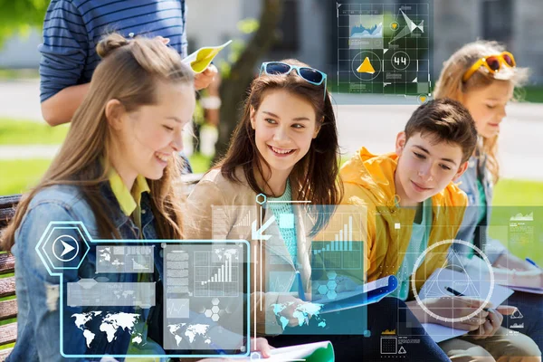 Teenage students with notebooks at school yard — Stock Photo, Image