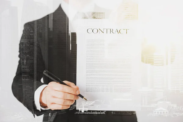 Close up of businessman holding contract paper — Stock Photo, Image