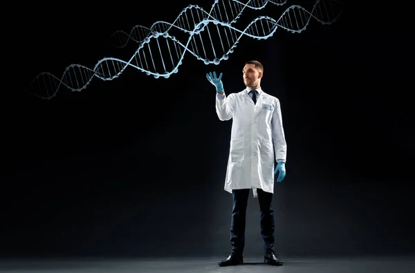 Vědec v laboratorní plášť a lékařské rukavice s dna — Stock fotografie