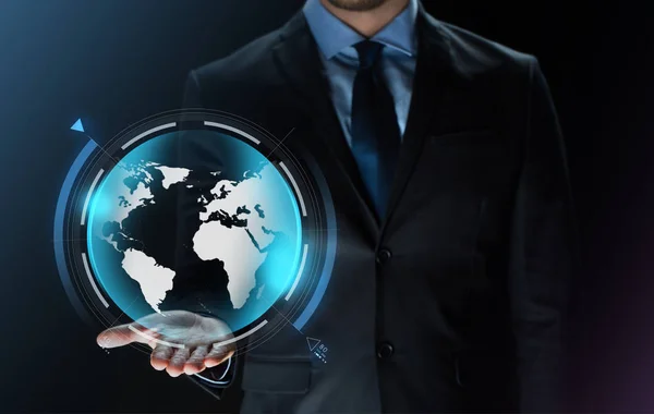 Close up of businessman with earth projection — Stock Photo, Image