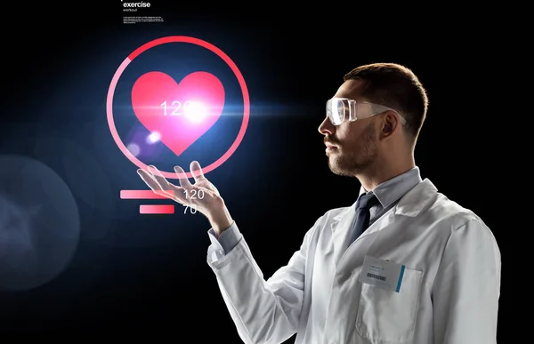 Doctor or scientist with heart rate projection — Stock Photo, Image