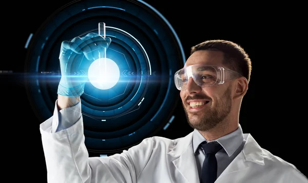 Científico sonriente en gafas con tubo de ensayo — Foto de Stock