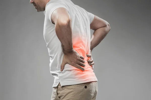 Close up of man suffering from backache — Stock Photo, Image