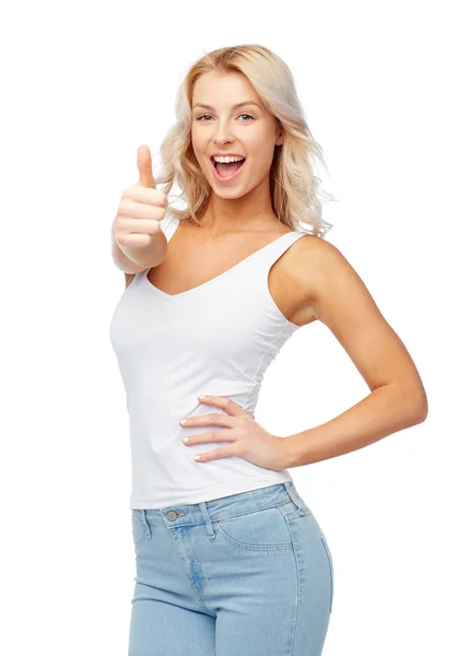 Šťastná mladá žena ukazuje palec — Stock fotografie