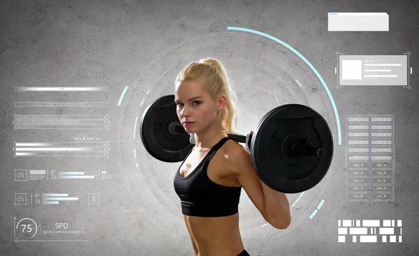 Young sporty woman exercising with barbell — Stock Photo, Image