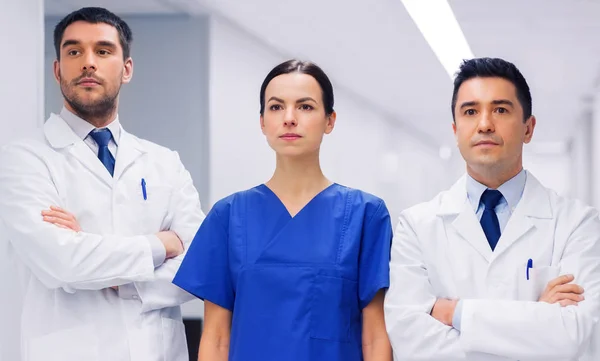 Group of medics or doctors at hospital — Stock Photo, Image