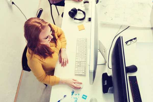 Smiling businesswoman or student with computer — Stock Photo, Image