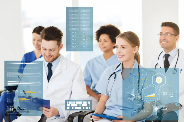 Group of happy doctors on seminar at hospital — Stock Photo, Image