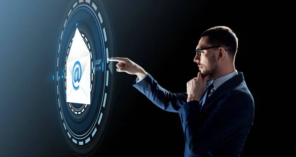 Businessman with e-mail message hologram — Stock Photo, Image