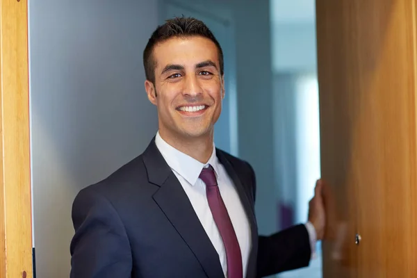 Businessman at hotel room or office door — Stock Photo, Image