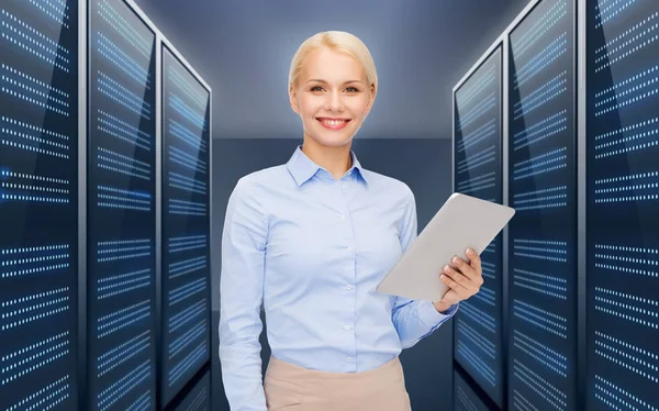 Businesswoman with tablet pc over server room — Stock Photo, Image