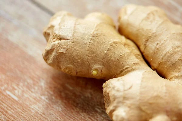 Close up of ginger root on wooden table — Stock Photo, Image