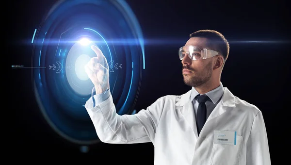 Scientist in goggles with virtual projection — Stock Photo, Image