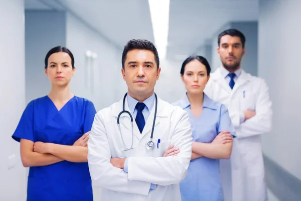 Group of medics or doctors at hospital — Stock Photo, Image
