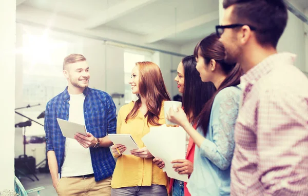 Creative team on coffee break talking at office — Stock Photo, Image