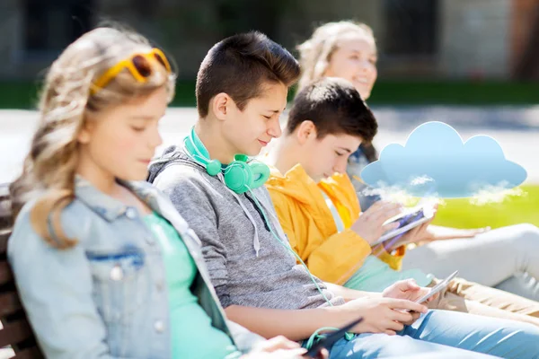 Happy teenage boy with tablet pc and headphones — Stock Photo, Image