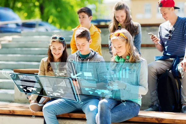 Happy teenage friends with smartphones outdoors — Stock Photo, Image