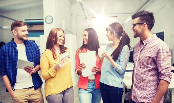 Creative team on coffee break talking at office — Stock Photo, Image