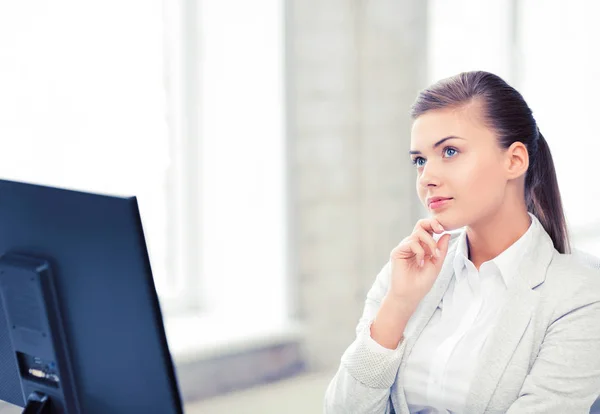 Pensive woman in office — Stock Photo, Image