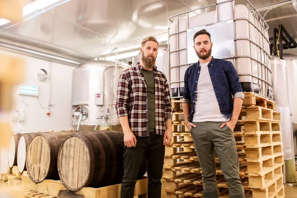 Men at craft brewery or beer plant — Stock Photo, Image